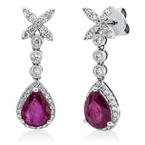 Ohrschmuck 18 kt WG, 22 Brill. 0,31 ct, W-pi, 42 Brill. 0,25 ct, W-pi, 2 Rubine 2,38 ct rot
