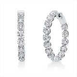 Creolen 18 kt WG, 3 Brill. 0,79 ct, I-si, 25 Brill. 6,31 ct, F-vvs