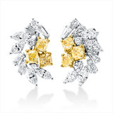 Ohrstecker 18 kt WG+GG, 8 Trap. 0,31 ct, 8 Nav. 0,70 ct, 6 Brill. 0,13 ct, TW-si, 6 Cushion 1,00 ct, gelb