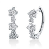 Creolen 18 kt WG, 42 Brill. 0,59 ct, TW-si, 6 Brill. 0,04 ct, TW-si