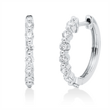 Creolen 18 kt WG, 14 Brill. 0,63 ct, TW-si