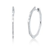 Creolen 18 kt WG, 10 Bag. 0,30 ct, TW-si, 32 Brill. 0,14 ct, TW-si