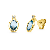 Ohrstecker 18 kt GG, 2 Brill. 0,03 ct, TW-si, 2 Topase 0,88 ct blau