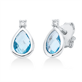 Ohrstecker 18 kt WG, 2 Brill. 0,03 ct, TW-si, 2 Topase 0,99 ct blau