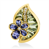 Brosche 18 kt GG, 9 Brill. 0,04 ct, TW-si, 10 Peridot 2,60 ct grün, 5 Tansanit 1,40 ct blau