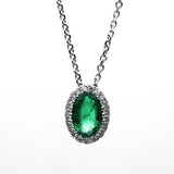 Collier 18 kt WG, 20 Brill. 0,06 ct, TW-si, 1 Smaragd 0,34 ct grün