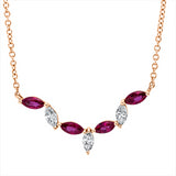 Collier 14 kt RG, mit ZÖ 41 cm + 43 cm, 3 Nav. 0,21 ct, TW-si, 4 Rubine 0,44 ct rot
