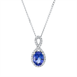 Collier 14 kt WG, mit ZÖ 40 cm + 43 cm, 34 Brill. 0,19 ct, TW-si, 1 Tansanit 1,34 ct blau