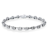 Armband 18 kt WG, GIA: 15pcs, 9 Brill. 4,12 ct, I-vsi, 6 Brill. 2,69 ct, I-vvs, 19 Bag. 1,74 ct, 4 Brill. 1,46 ct
