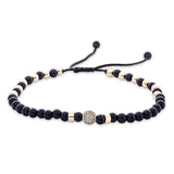 Armband 18 kt RG, black cord, 31 Brill. 0,16 ct, braun, 34 Onyx 14,25 ct schwarz