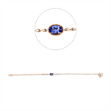 Armband 18 kt RG, 10 Brill. 0,11 ct, TW-pi, 1 Tansanit 0,51 ct blau