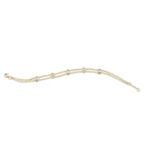 Armband 18 kt GG, mit ZÖ 16,5 cm, 15 Bag. 0,22 ct, TW-si, 30 Brill. 0,12 ct, TW-si