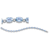 Armband 18 kt WG, 18 Brill. 0,44 ct, TW-si, 18 Aquamarin 11,60 ct blau