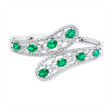 Armreif 18 kt WG, 108 Brill. 2,63 ct, F-vvs/vs, 32 Nav. 2,72 ct, F-vvs/vs, 8 Smaragde 5,55 ct grün