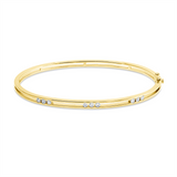 Armreif 18 kt GG, 9 Brill. 0,32 ct, TW-pi
