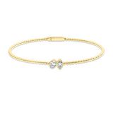 Armreif 18 kt GG, 1 Oval 0,22 ct, TW-si, 1 Nav. 0,17 ct, TW-si
